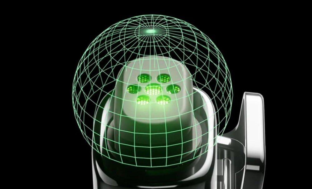 System bezprzewodowy MAONO WM622 PC2 zbliżenie na górną część mikrofonu z widoczną siatką otworów, nad którą nałożono schematyczną zieloną siatkę w kształcie półkuli symbolizującą dookólny zasięg zbierania dźwięku