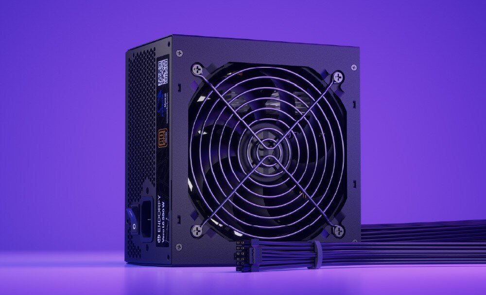 Zasilacz ENDORFY Vero L6 Front zasilacza z widocznym wentylatorem osłoniętym drucianym grillem oraz wychodzącą wiązką czarnych płaskich przewodów, opis