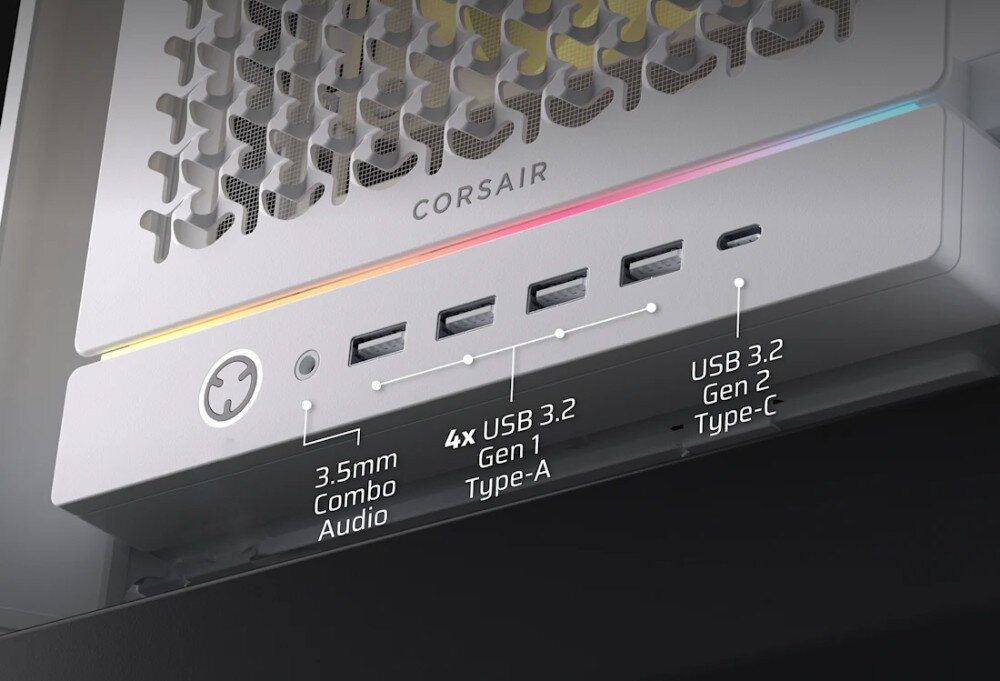 Obudowa CORSAIR Frame 5000D RS ARGB Zbliżenie na dolny panel portów zewnętrznych obudowy. Od lewej znajduje się okrągły przycisk zasilania, gniazdo audio 3.5 mm combo, cztery porty USB 3.2 Gen 1 typu A oraz jeden port USB 3.2 Gen 2 typu C