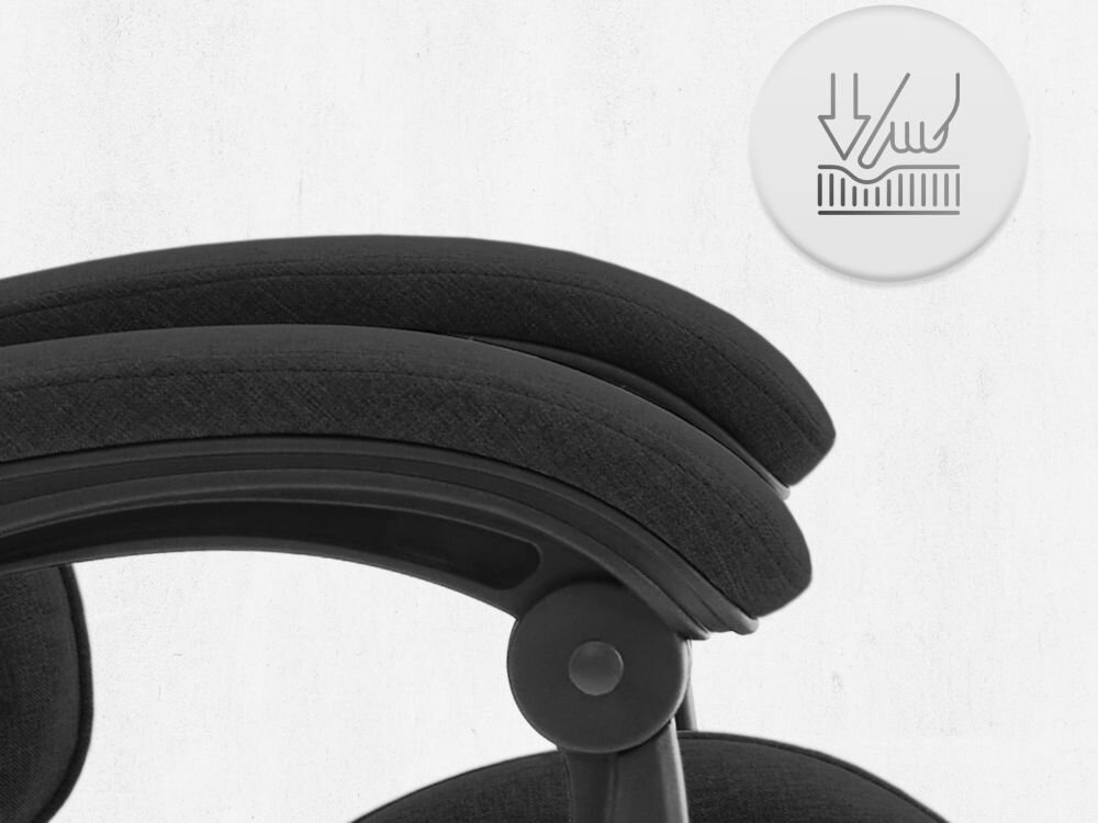 Fotel CABRO C500 Czarny Zbliżenie na miękki podłokietnik fotela z ikoną nacisku, podkreślającą komfort użytkowania i jakość wypełnienia fotel gamingowy z podłokietnikami z miękkimi padami