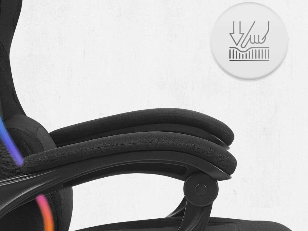 Fotel Cabro C502 LED Czarny Zbliżenie na miękki podłokietnik fotela z ikoną nacisku, podkreślającą komfort użytkowania i jakość wypełnienia fotel gamingowy z podłokietnikami z miękkimi padami