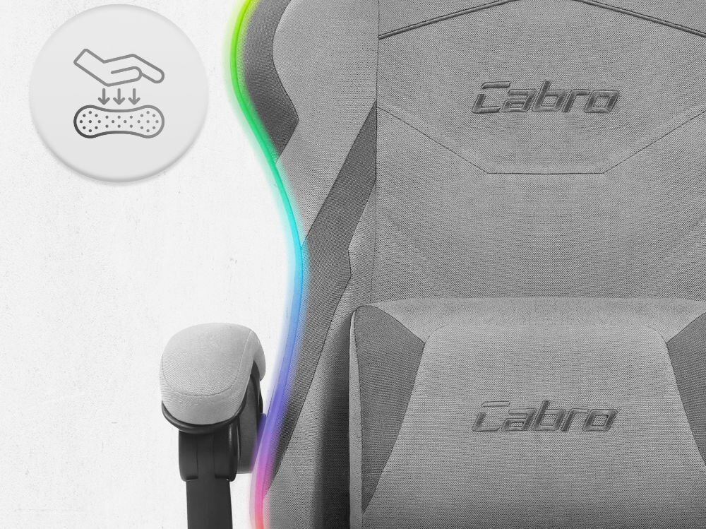 Fotel CABRO C502 LED Szary Zbliżenie na oparcie i podłokietnik fotela z ikoną dłoni naciskającej miękką piankę wypełniającą fotel gamingowy z oddychającą tapicerką z tkaniny