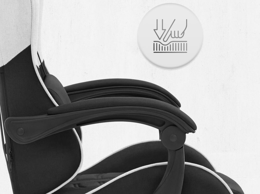 Fotel CABRO C501 Czarno-Biały Zbliżenie na miękki podłokietnik fotela z ikoną nacisku, podkreślającą komfort użytkowania i jakość wypełnienia fotel gamingowy z podłokietnikami z miękkimi padami