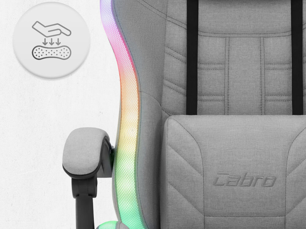 Fotel CABRO C501 LED Szary Zbliżenie na oparcie i podłokietnik fotela z ikoną dłoni naciskającej miękką piankę wypełniającą fotel gamingowy z oddychającą tapicerką z tkaniny