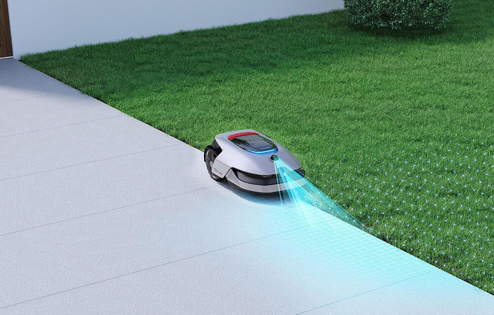 Robot koszący DREAME A2 robot na trawie kamera monitoruje przestrzeń wokół funkcja Garden Guardian bezpieczeństwo posesji tryb patrolu poza godzinami pracy system monitoruje otoczenie w czasie rzeczywistym wysyła powiadomienia