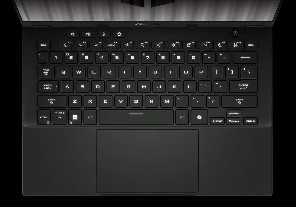 Klawiatura laptopa ASUS TUF Gaming widziana z góry pokazuje pełny układ klawiszy do precyzyjnego sterowania w grach – pełnowymiarowa klawiatura z podświetleniem RGB i szklanym touchpadem do gier pisania i kodowania