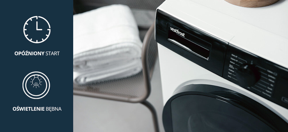 Suszarka VESTFROST VT-FW4EHY70EU Na zdjęciu pokazano fragment suszarki Vestfrost z ciemnym frontem – widoczny jest panel sterowania oraz obrzeże drzwi bębna. Po lewej stronie umieszczono ikonę informującą o funkcji opóźnionego startu oraz oświetleniu bębna w urządzeniu oświetlenie bębna z timerem opóźniony start wyświetlacz LED wygodna obsługa z wyświetlaczem kontrola czasu funkcje komfortu