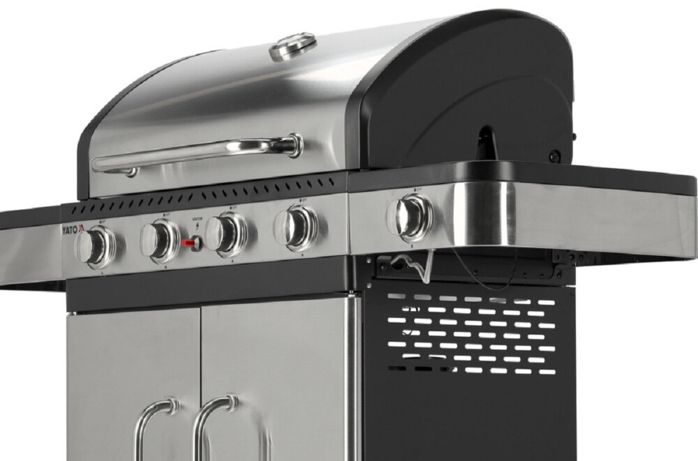 Grill gazowy YATO YG-20019 wbudowany w pokrywe termometr zaplon piezo na srodku panelu sterowania wygodna obsluga