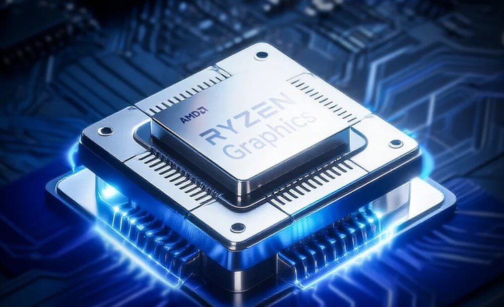 Komputer GMKTEC M5 Ultra Zbliżenie na srebrny procesor z napisem 'AMD RYZEN Graphics' zamontowany na niebieskiej płytce drukowanej z podświetleniem u podstawy