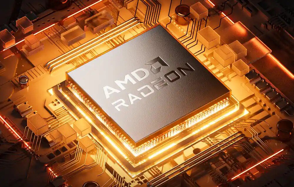 Komputer GMKTEC M6 Ultra Graficzne przedstawienie procesora AMD Radeon z logo na mikrochipie w pomarańczowym świetle