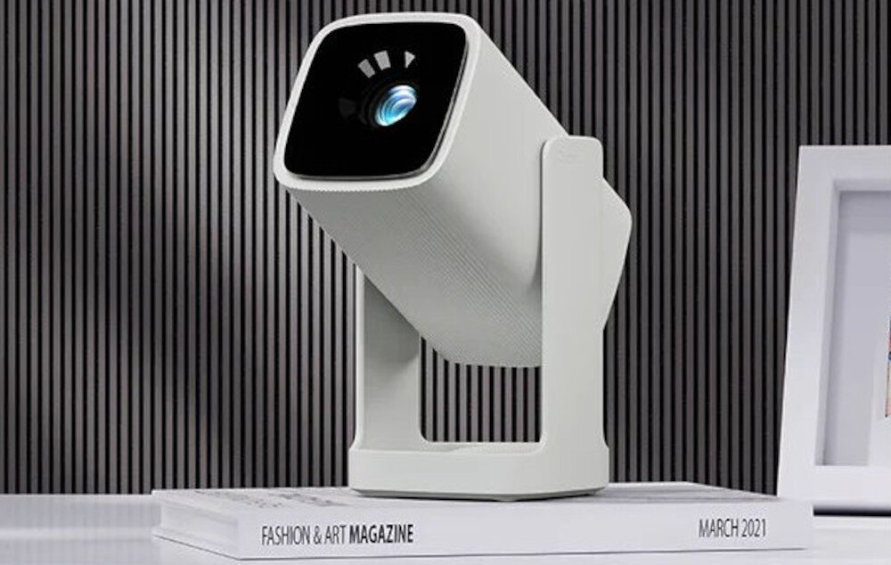 Projektor WANBO Cube 1 gimbal 360 stopni projekcja sufitowa regulacja kąta, projektor stojący na książce