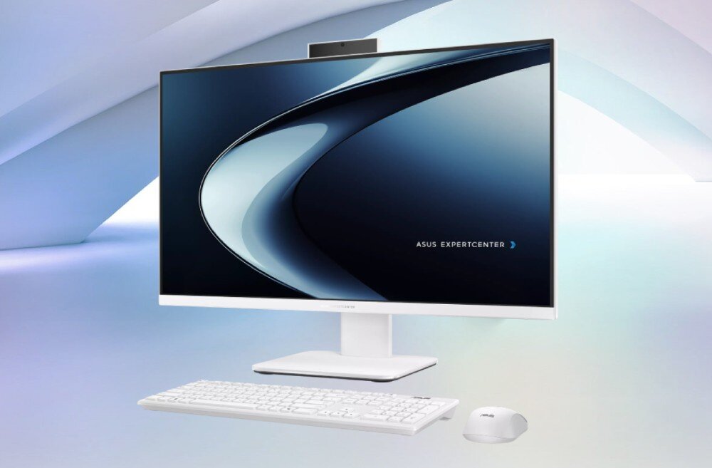 Komputer All in One ASUS ExpertCenter P470VAK-WPE040X Stanowisko pracy z białym komputerem All in One, klawiaturą i myszką na jasnym, wielokolorowym tle z geometrycznymi łukami, opis