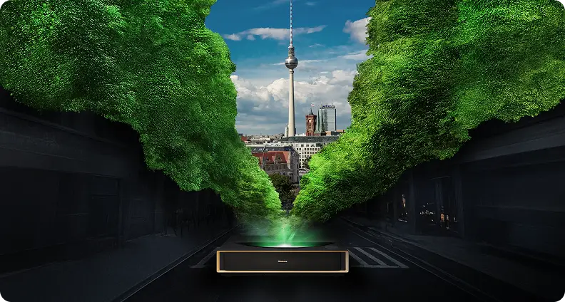 Projektor wyświetlający wieżę telewizyjną w Berlinie otoczoną kępami mchu, symbolizującymi ekologię.