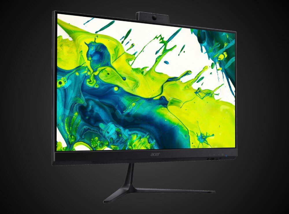 Komputer All in One ACER Aspire C24-2YE13U5UNL Monitor komputera stacjonarnego widziany pod kątem na czarnym tle, urządzenie ma cienkie ramki oraz kamerę internetową zamontowaną na górnej krawędzi, na ekranie wyświetla się wielobarwna plama farby, cechy, przeznaczenie