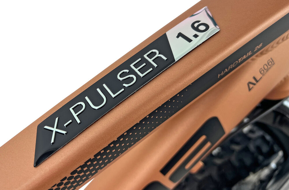 Rower górski MTB INDIANA X-Pulser 1.6 D15 26 cali damski Złoty zbliżenie na ramę białe tło komfort jazdy odpowiednia kontrola nad rowerem 15-calowa aluminiowa rama rower jest bardzo zwinny lekki łatwo podnieść go odporność na korozję wybór rozmiaru ramy Twój wzrost mierzony w zrelaksowanej pozycji typ roweru dla osób o wzroście od 154 do 165 cm