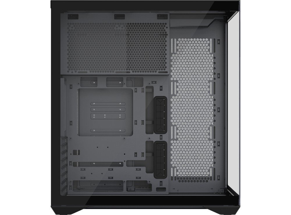 Obudowa MODECOM Volcano Space XL Full Tower NF Wnętrze pustej obudowy widziane z boku. Po lewej stronie znajduje się wnęka na zasilacz i dyski, a po prawej miejsce na płytę główną. Ściana boczna posiada gęstą perforację ułatwiającą przepływ powietrza oraz otwory do sprawnego prowadzenia przewodów