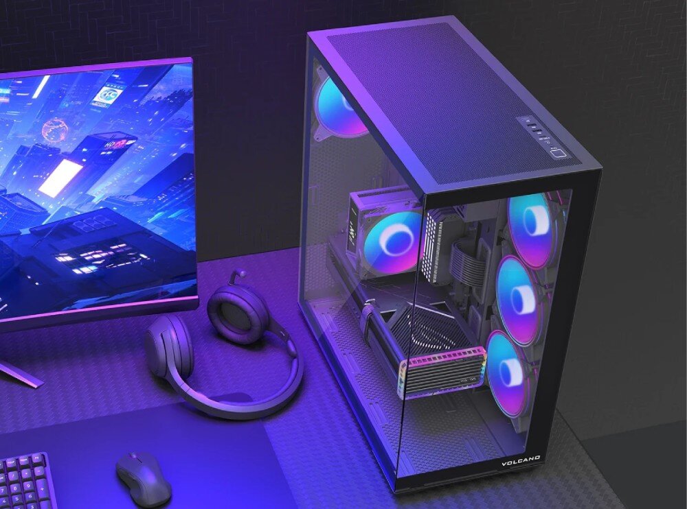 Obudowa MODECOM Volcano Space XL ARGB Full Tower 5F Widok z góry na czarną obudowę komputerową z panelami ze szkła hartowanego, przez które widać podświetlone podzespoły. Na górnym panelu umieszczono perforowaną siatkę oraz porty wejścia i wyjścia