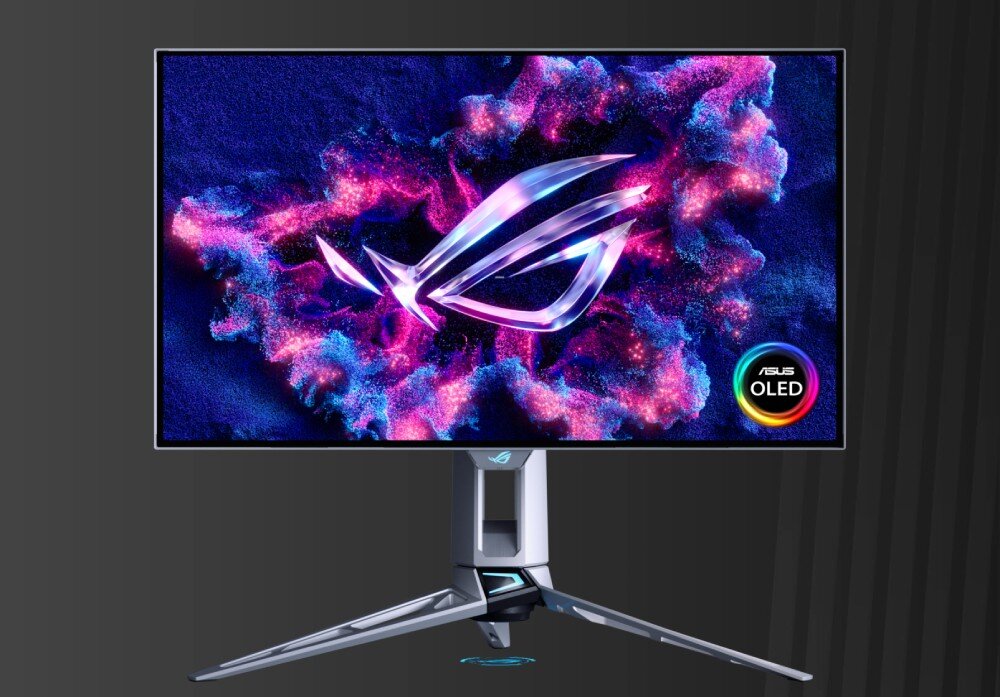 Monitor ASUS ROG Swift PG27AQWP-W Przód monitora na ciemnym tle. Na ekranie widać trójwymiarowe świecące logo przypominające oko i napis 'DARE TO INNOVATE' umieszczony na górze