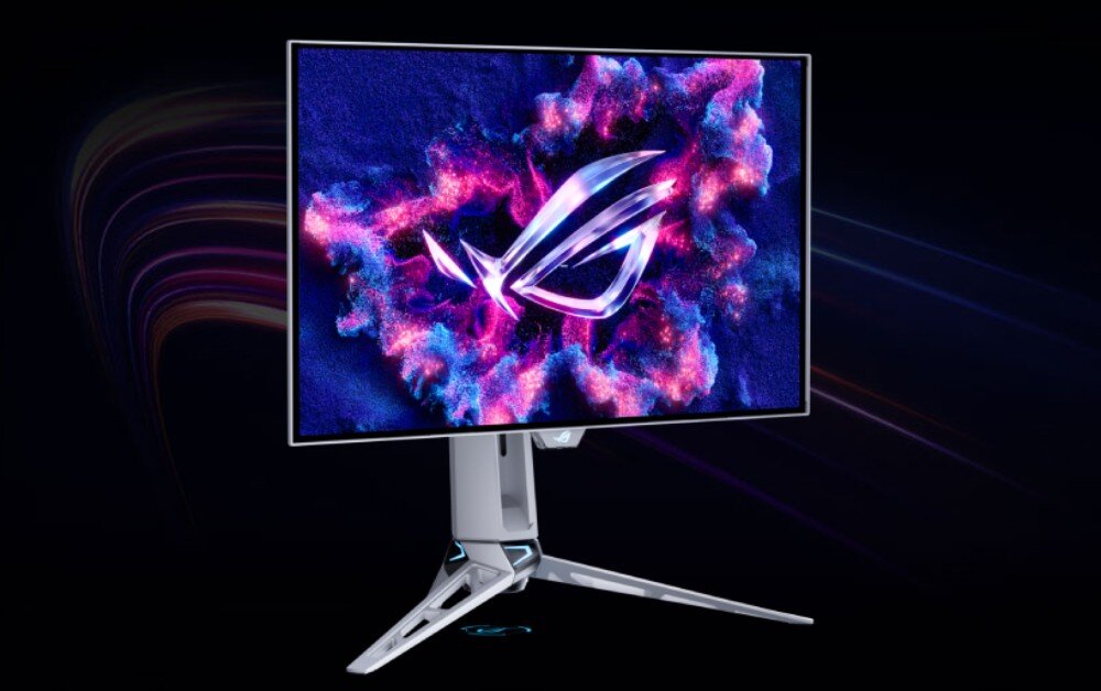 Monitor ASUS ROG Swift PG27AQWP-W Lekko obrócony monitor na ciemnym tle z rozmytymi fioletowymi smugami światła. Ekran wyświetla przestrzenne logo i napis 'DARE TO INNOVATE'