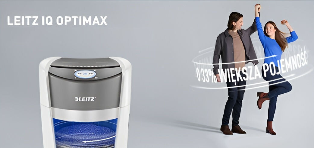 Obraz przedstawia niszczarkę z napisem \'LEITZ IQ OPTIMAX\' oraz logo \'LEITZ\'. Obok znajdują się dwie osoby, a nad nimi napis \'O 33% WIĘKSZA POJEMNOŚĆ\'.