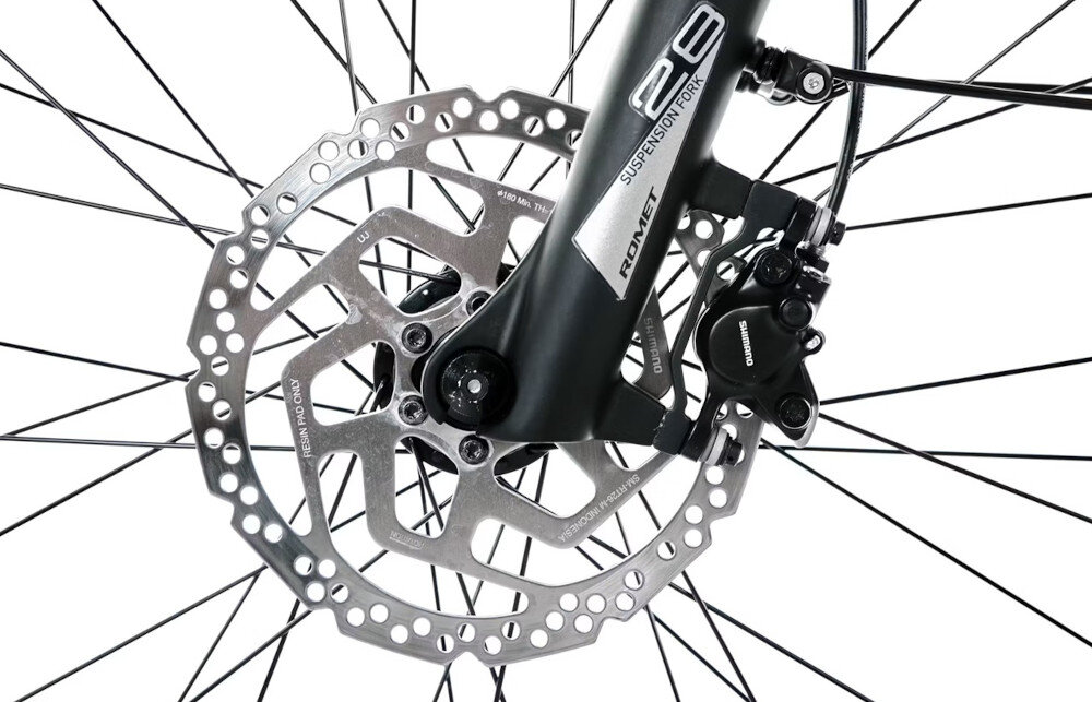 Rower elektryczny ROMET E-Modeco SUV 1.0 AN U19 28 cali Złoty zbliżenie na tarczę hamulcową podstawa bezpieczeństwa hamulce tarczowe hydrauliczne duża siła hamowania płyn hamulcowy hamulce z przodu i z tyłu podwójny pakiet bezpieczeństwa