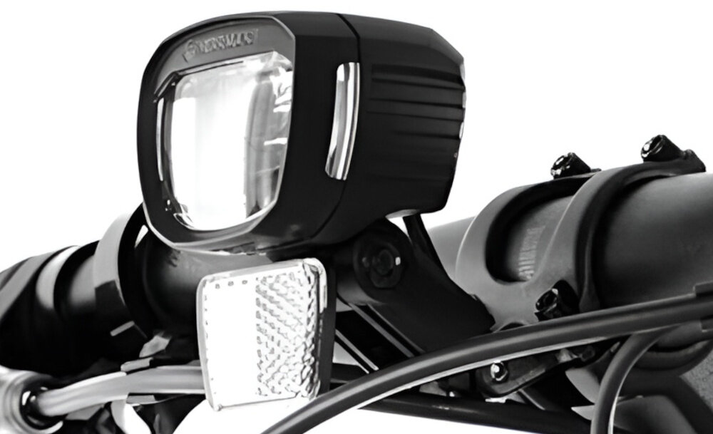 Rower elektryczny ROMET E-Modeco SUV 1.0 AN U19 28 cali Szary zbliżenie na tylną lampę bezpieczeństwo przednie i tylne oświetlenie dobra widoczność i bezpieczeństwo na drodze wymagane przez prawo drogowe