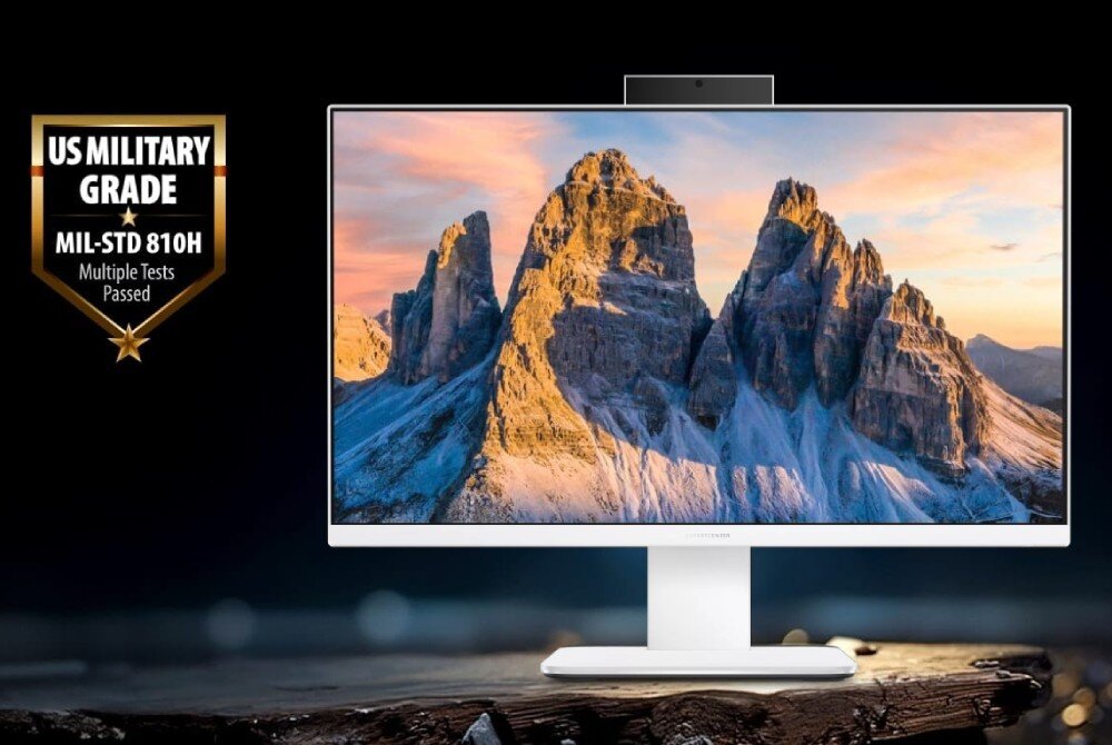 Komputer All in One ASUS ExpertCenter P440VAK-WPC204X komputer stacjonarny wyświetlający tapetę ze skalistymi szczytami górskimi o zachodzie słońca, umieszczony na ciemnym tle, z widocznym po lewej stronie złotym znakiem z napisem 'US MILITARY GRADE MIL-STD 810H Multiple Tests Passed', konstrukcja, wielkość, system, wytrzymałość