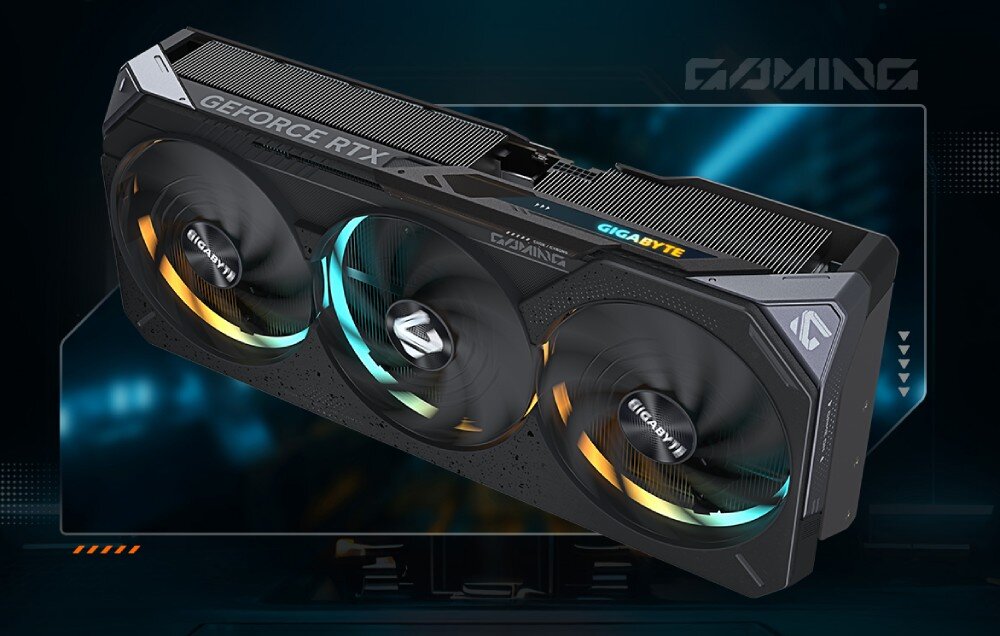 Karta graficzna GIGABYTE GeForce RTX 5090 Gaming OC 32GB Ujęcie karty graficznej z efektem świetlnym RGB na wentylatorach oraz logo Gigabyte na górnej części obudowy