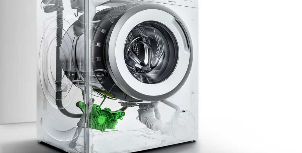 PRALKA BOSCH WGE02400PL lifestyle wnętrze silnik konstrukcja budowa wewnętrzna elementy mechanizm zielone odznaczenie silnik napęd silnik trwały cichy napęd EcoSilence Drive minimalny hałas trwałość oszczędnośc energii około 72 dB