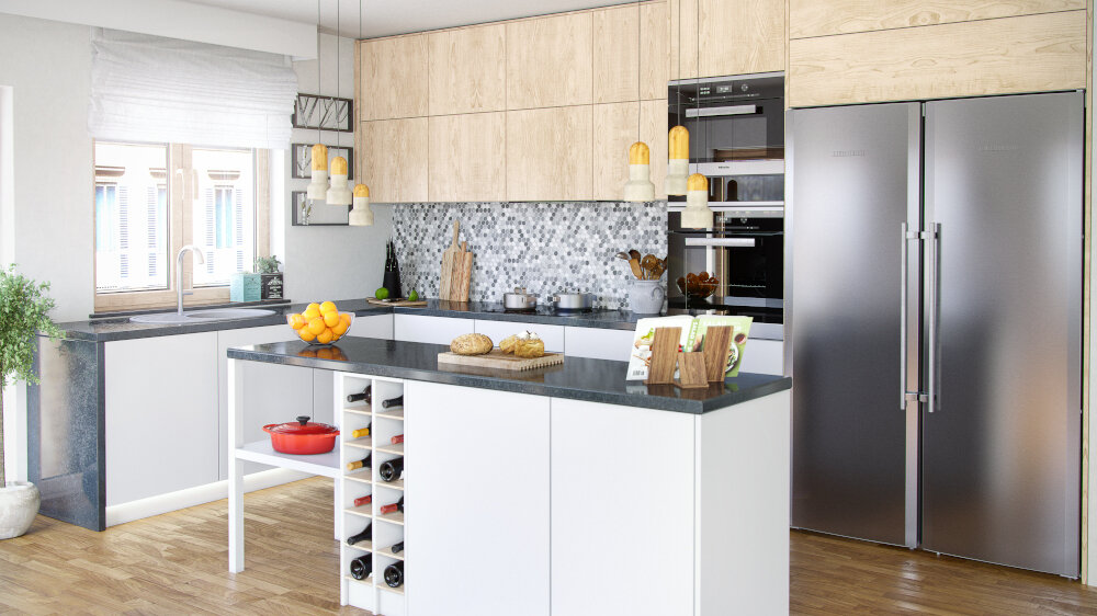 Nowoczesna kuchnia z wyspą, na której znajdują się owoce i chleb. W tle widać lodówkę, piekarnik oraz mozaikowy backsplash nad blatem kuchennym.