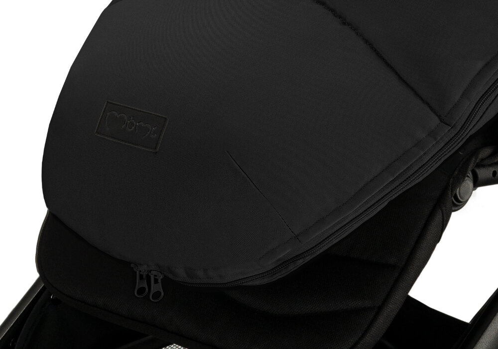 Śpiworek MOMI Cozy Czarny Praktyczne zamki Dwustronne zamki po bokach szybkie wietrzenie wspiera krótkie wyjścia do sklepu i długie, zimowe spacery