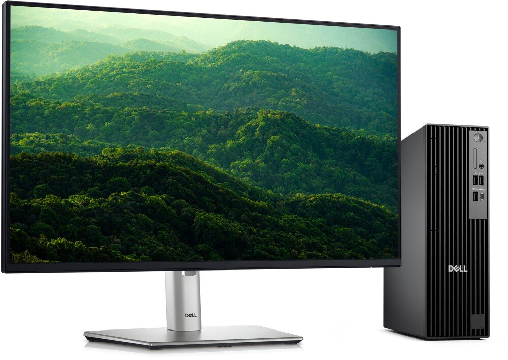 Komputer DELL Pro Slim Plus QBS1250 Komputer stacjonarny w wąskiej czarnej obudowie stoi pionowo obok monitora, na którym wyświetlone jest zdjęcie zalesionych wzgórz spowitych mgłą, ekologia, środowisko, recykling