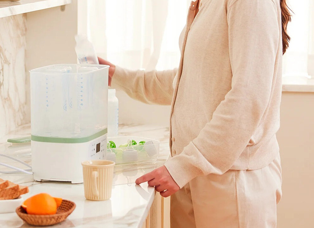 Sterylizator MOMCOZY BS002 8w1 wygląd design tło wizualizacja Higiena bez zbędnego wysiłku