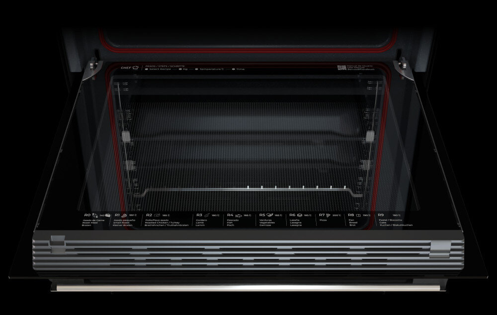 Piekarnik TEKA NEO HSB 6350 SS Zdjęcie ukazuje otwarte wnętrze piekarnika z widoczną szybą frontową oraz czerwoną uszczelką wokół komory, a także opisami funkcji umieszczonymi na dolnej krawędzi drzwi. Wnętrze urządzenia jest przestronne, a światło podkreśla detale konstrukcji chef funkcja automatyczne programy pieczenie komfort