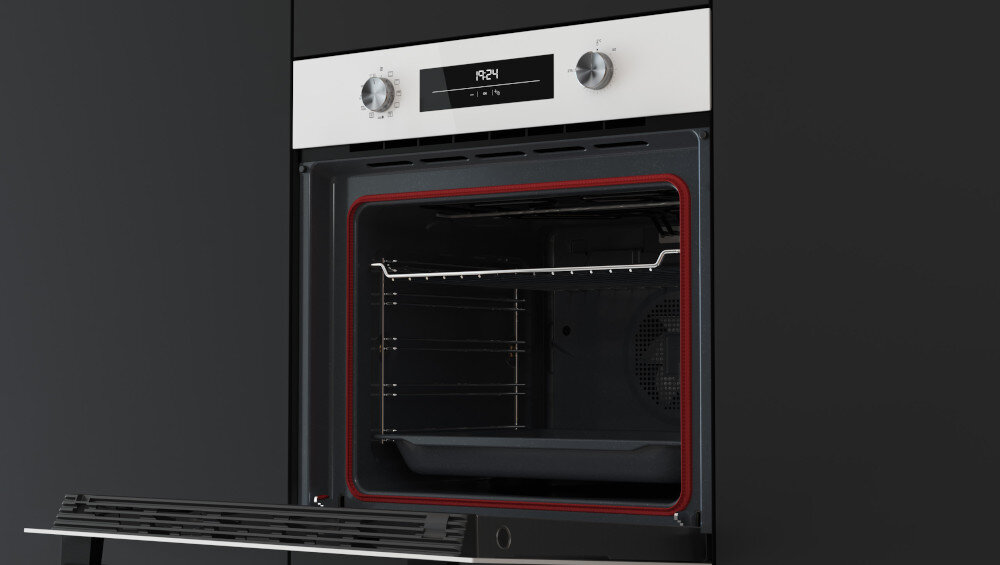 Piekarnik TEKA Neo HSB 6250 P WH Zdjęcie pokazuje otwarty piekarnik w ciemnej zabudowie kuchennej, z wysuniętą tacą i widoczną czerwoną uszczelką wokół komory. U góry urządzenia znajduje się panel sterowania z pokrętłami i wyświetlaczem 70 litrów przestrzeni to gwarancja swobody podczas pieczenia