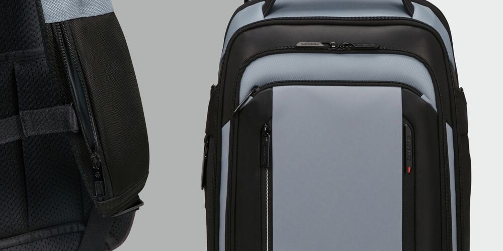 Plecak na laptopa SAMSONITE Spectrolite 4.0 15.6 cali - Przemyślana organizacja, dwa schowki na suwak, trzy przegródki na akcesoria, RFID,  plecak z boku na szarym tle