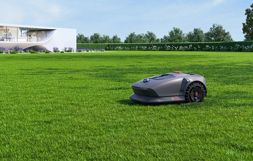 Robot koszący DREAME Mova 1000 robot na trawie w tle dom żywopłot i niebo inteligentny pomocnik perfekcyjny trawnik bez wysiłku inteligentne koszenie zadbany trawnik zdalne koszenie innowacyjne technologie intuicyjne rozwiązania