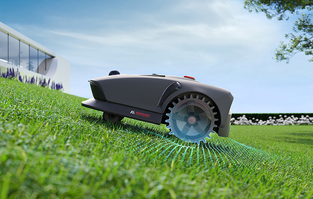 Robot koszący DREAME Mova 1000 robot na trawie jedzie pod górkę zaznaczenie na kołach wytrzymałe koła terenowe dobra przyczepność minimalizują ryzyko poślizgu zapobiegają uszkodzeniom trawnika zaawansowana konstrukcja kół nacisk na podłoże jest równomiernie rozłożony