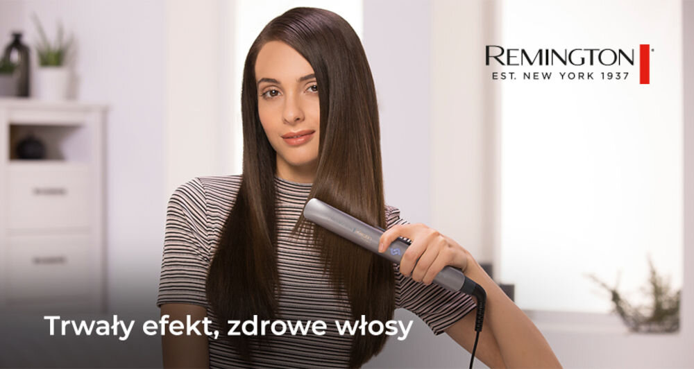 Osoba używa prostownicy do włosów w jasnym pomieszczeniu. Widoczny tekst: \'Trwały efekt, zdrowe włosy\', logo: \'REMINGTON EST. NEW YORK 1937\'.