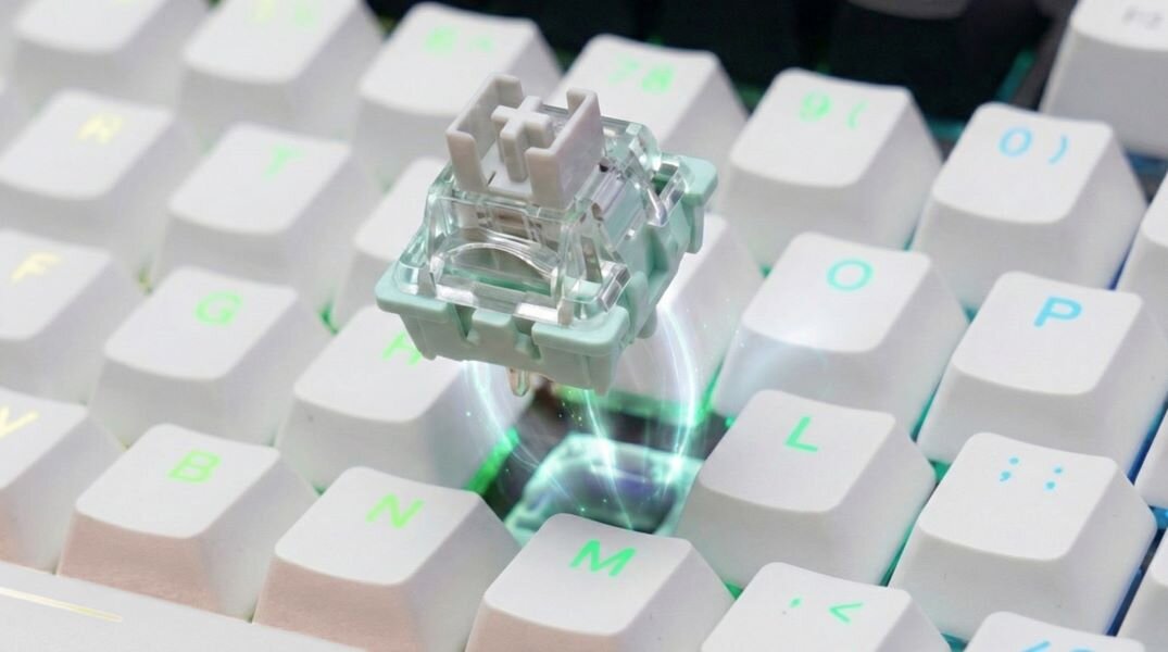 Klawiatura SAVIO Astral SAVIO Astral przełączniki Outemu White Jade czujnik Halla pola magnetycznego klasycznego styku mechanicznego Odczyt pozycji klawisza tradycyjnych przełączników mechanicznych 100 milionów kliknięć - zbliżenie na przełącznik