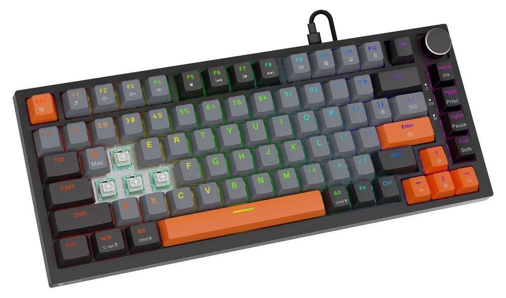 Klawiatura mechaniczna z kolorowymi klawiszami, w tym pomarańczowym klawiszem spacji i kilkoma przezroczystymi klawiszami. Widoczny jest także pokrętło w prawym górnym rogu.