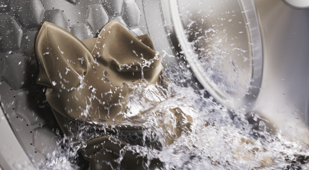 PRALKA MIELE WQ 1000 WPS zdjęcie lifestyle woda w bębnie ubranie ochrona przed wodą ochrona domu 20 lat bezpieczeństwo