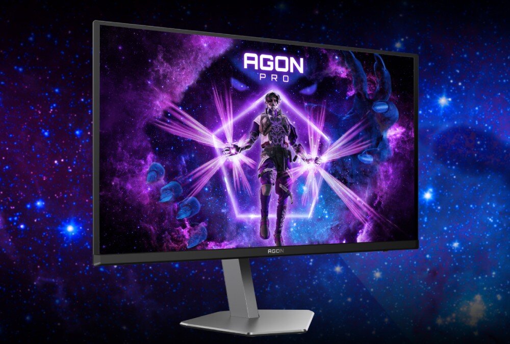 Monitor AOC Agon Pro AG276QZD2 Monitor na tle niebiesko-fioletowej przestrzeni kosmicznej z centralnie wyświetloną postacią i logo 'AGON PRO' u góry ekranu, głośnik, dźwięk