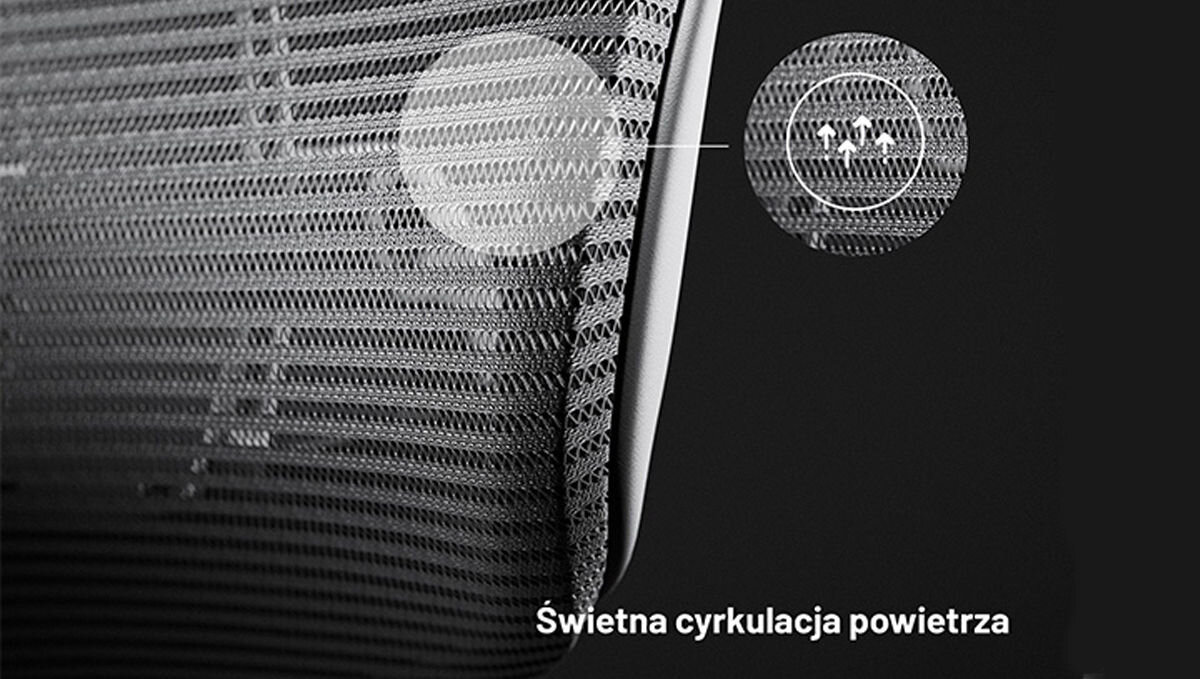 Obraz przedstawia fragment szarego fotela z siatkowym oparciem, z zaznaczeniem na świetną cyrkulację powietrza. Na dole widoczny jest tekst: \'Świetna cyrkulacja powietrza\'.