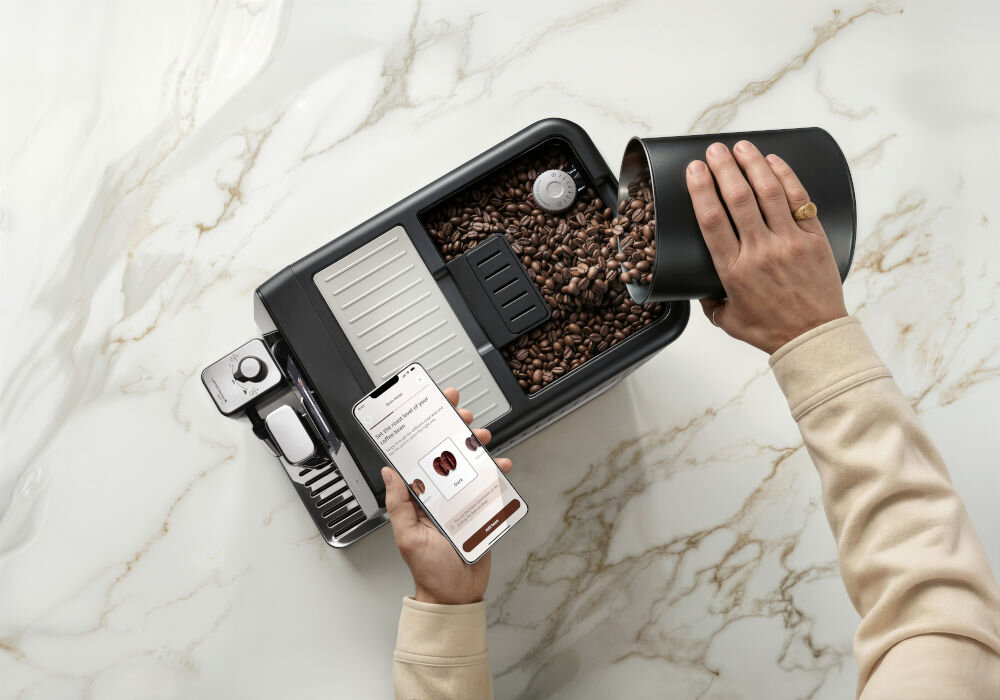 Personalizacja ustawień mielenia kawy w aplikacji mobilnej De'Longhi Coffee Link z użyciem technologii Bean Adapt w ekspresie Eletta Ultra.