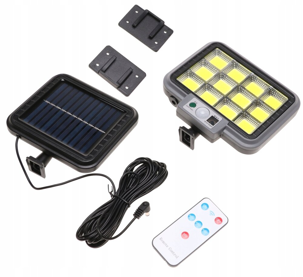 Na obrazie znajduje się zestaw lampy solarnej LED z czujnikiem zmierzchu i ruchu, w skład którego wchodzą panel solarny, lampa z diodami LED, pilot zdalnego sterowania oraz dwa uchwyty montażowe. Pilot posiada przyciski w kolorze niebieskim i czerwonym oraz napis \'Remote Control\'.