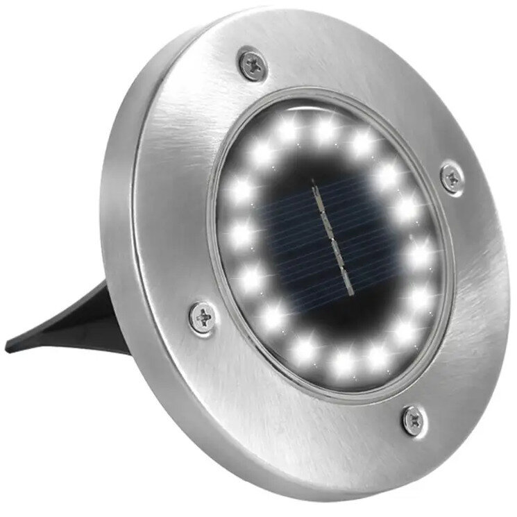 Okrągła lampa solarna z metalową obudową i widocznymi śrubami, z centralnym panelem słonecznym otoczonym jasnymi diodami LED.