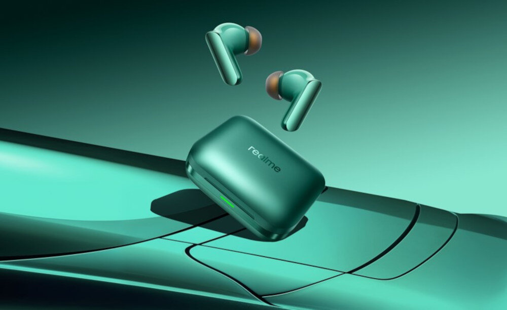 Słuchawki dokanałowe REALME Buds Air 7 Pro - Styl, który robi wrażenie, słuchawki dokanałowe z etui ładującym na zielonym tle