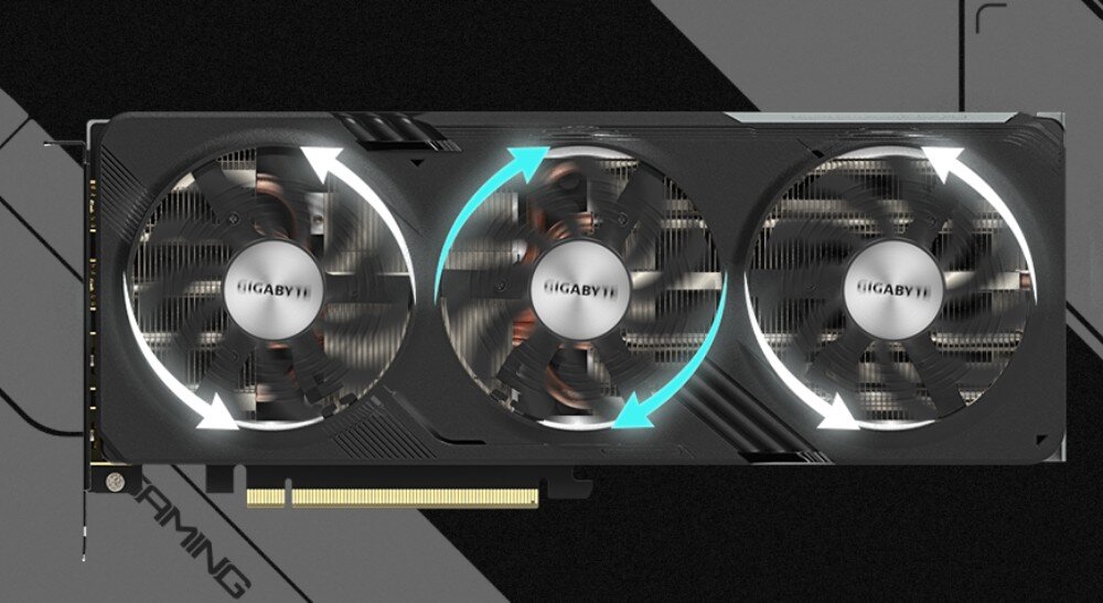 Karta graficzna GIGABYTE Radeon RX 7600 XT Gaming OC 16GB Widok z góry na kartę graficzną z zaznaczonym kierunkiem obrotu trzech wentylatorów, wentylatory, chłodzenie, temperatura