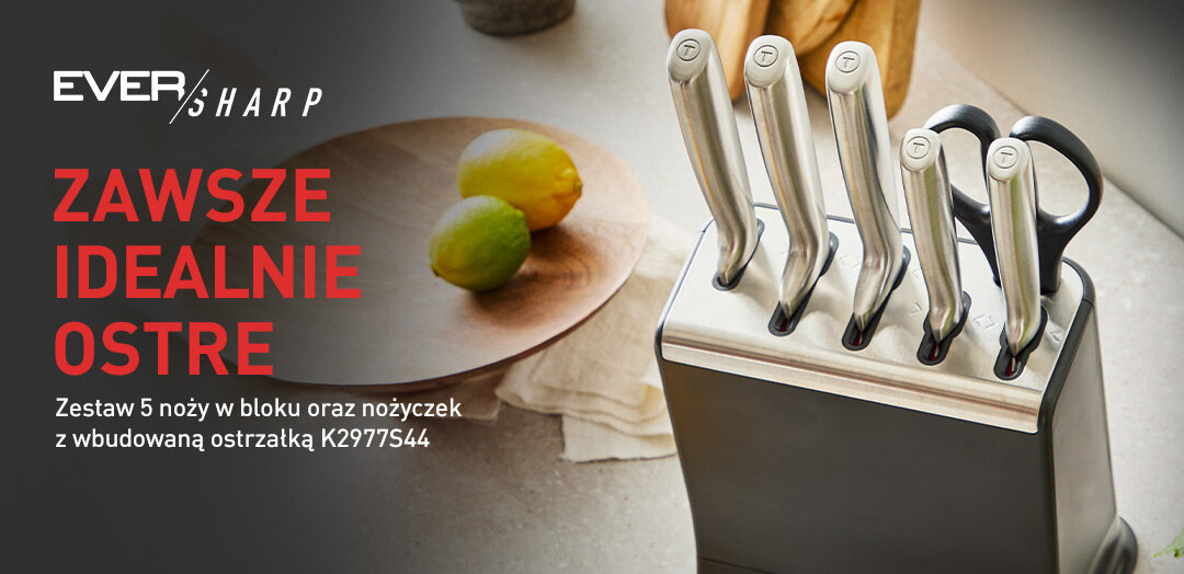 Zbliżenie na nóż Tefal Ever Sharp K2977S44 w bloku z automatyczną ostrzałką, podświetloną na niebiesko.